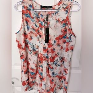 Rose & Olive- Women's pretty floral print top
Sleeveless.